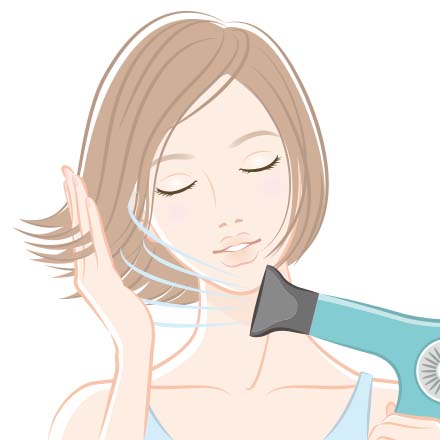 ドライヤーで髪を乾かす